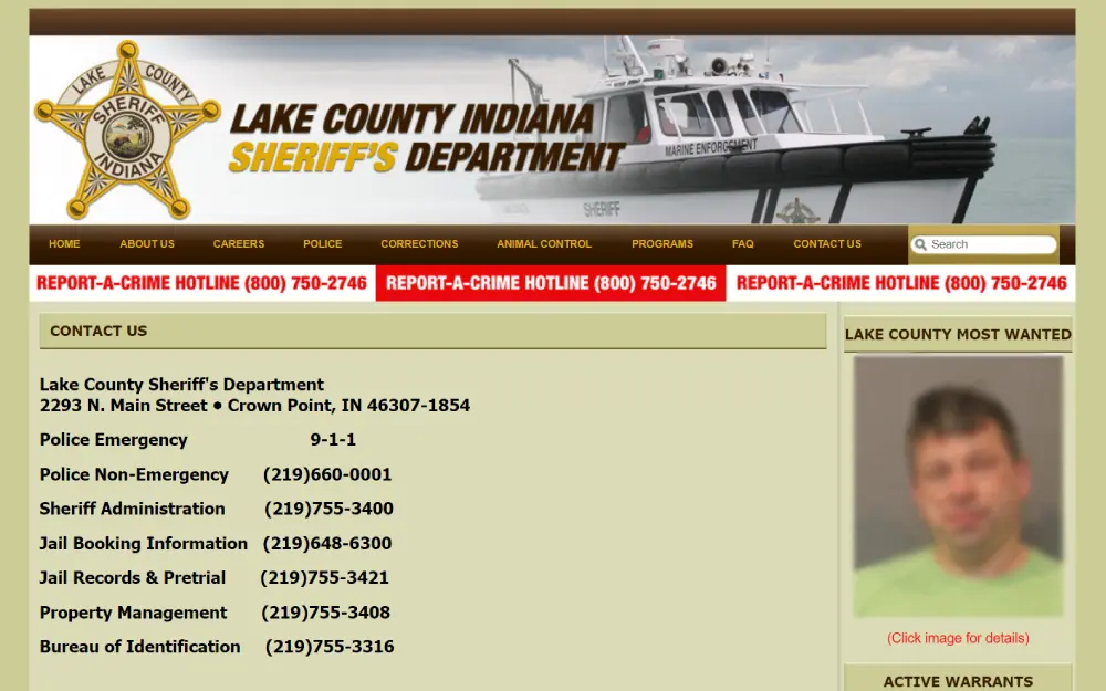 A screenshot from the Lake County Sheriff's Department with contact information featuring a photo of a marine enforcement boat, various department hotline numbers, and a separate section titled "Lake County Most Wanted" that includes a photograph and clickable link for further details on a wanted individual.